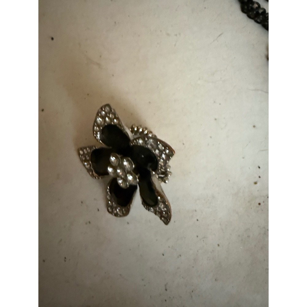 Paparazzi Silver Tone Black Enamel Rhinestone Flower Stretch Band Cocktail Ring